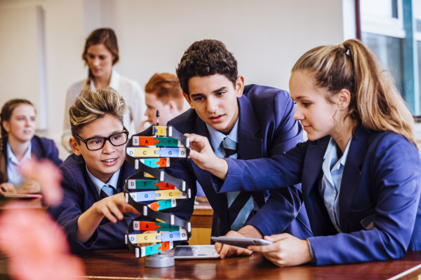 School students playing game in classroom